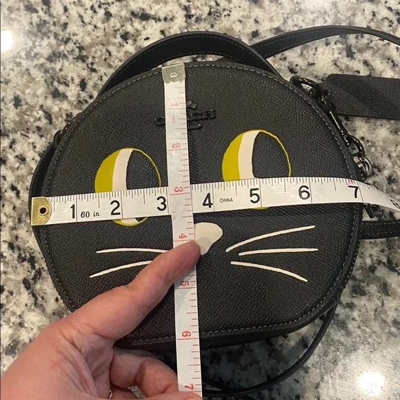 Coach Black Leather Cat Motif Round Crossbody with Yellow Eye Accents - Picture 8 of 11